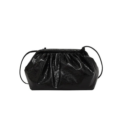 Simple hair clip closure crossbody bag in shell shape with sewing line detail on rose red PU material