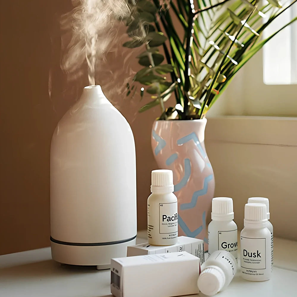 Ceramic ultrasonic aroma diffuser in white with 100ml tank, diffusing mist in home setting, 10cm diameter