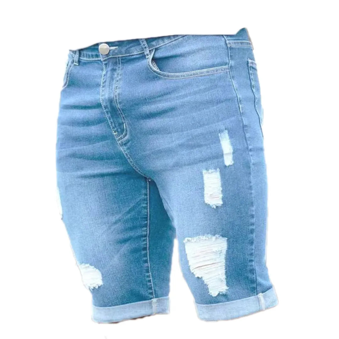 Men's sky blue denim shorts with multi-hole distressed design and a zip fly.