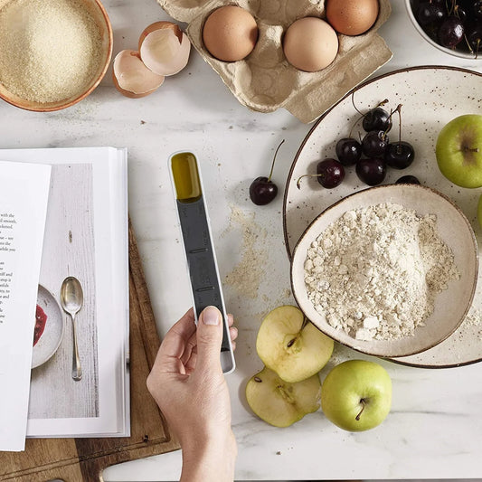 Adjustable 12-speed measuring spoon with gram scale for precise kitchen measurements