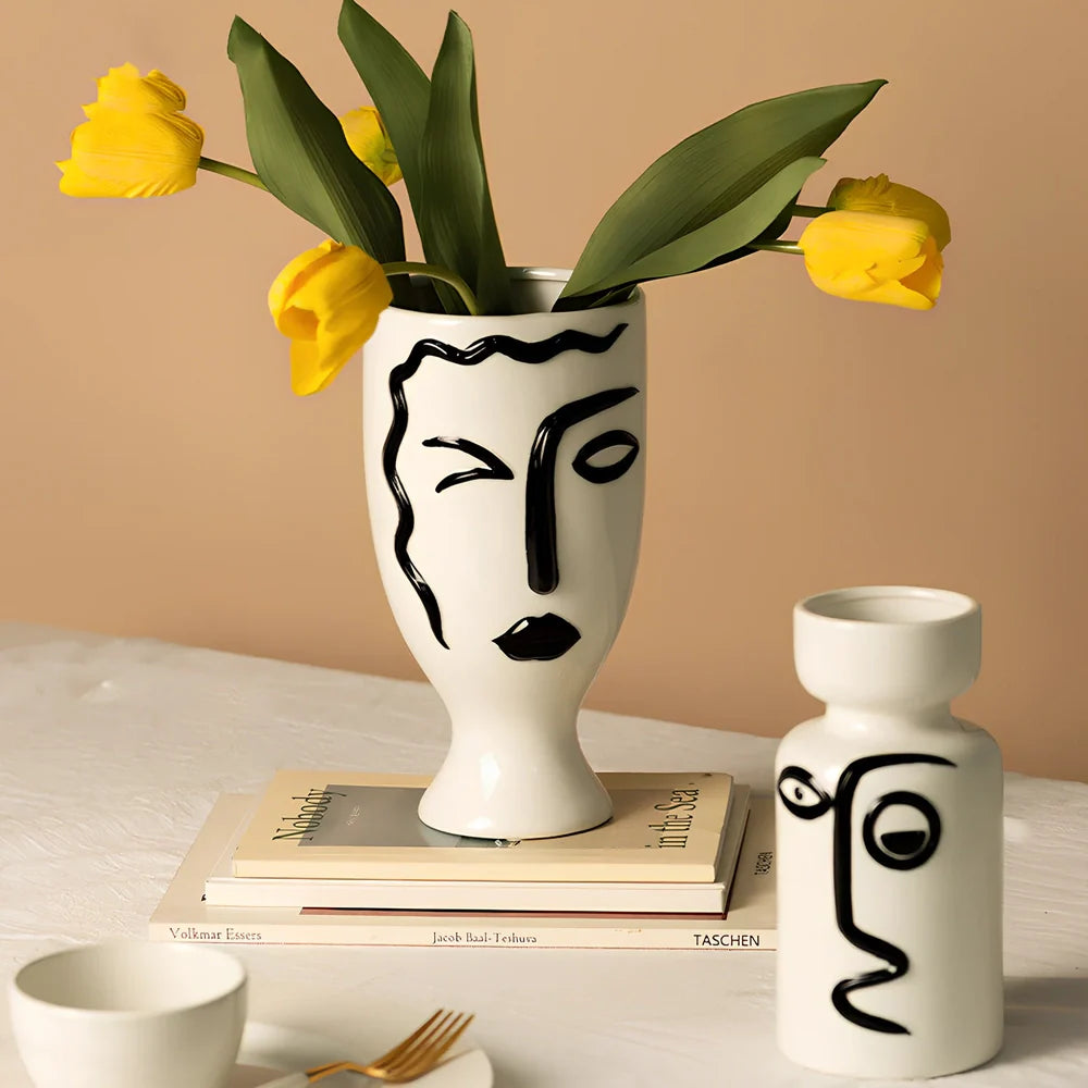 Ceramic vase with hand-painted surface in modern minimalist design, shown in large and small size variations