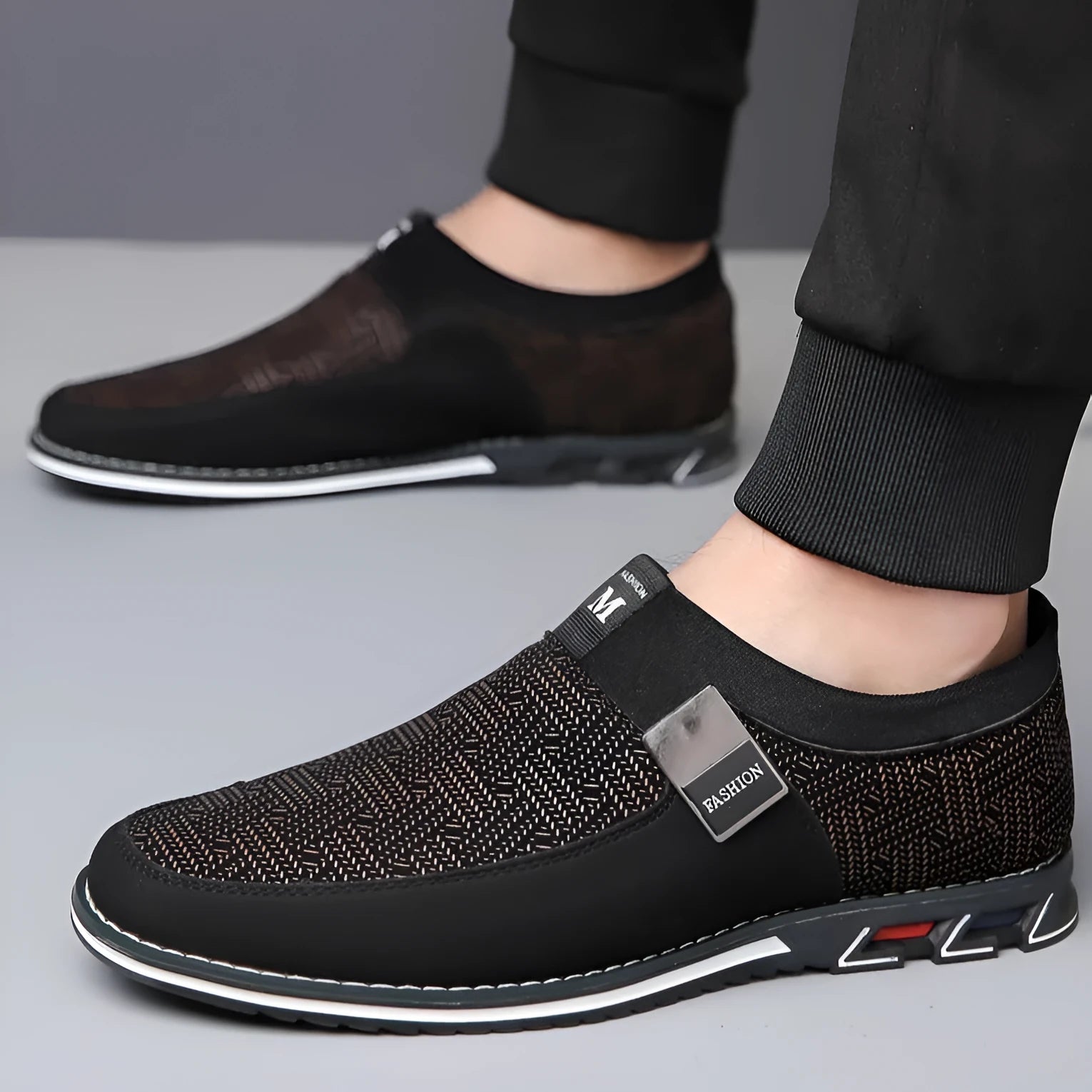 Men's grey and white synthetic leather casual shoes with square toe and flat rubber sole.