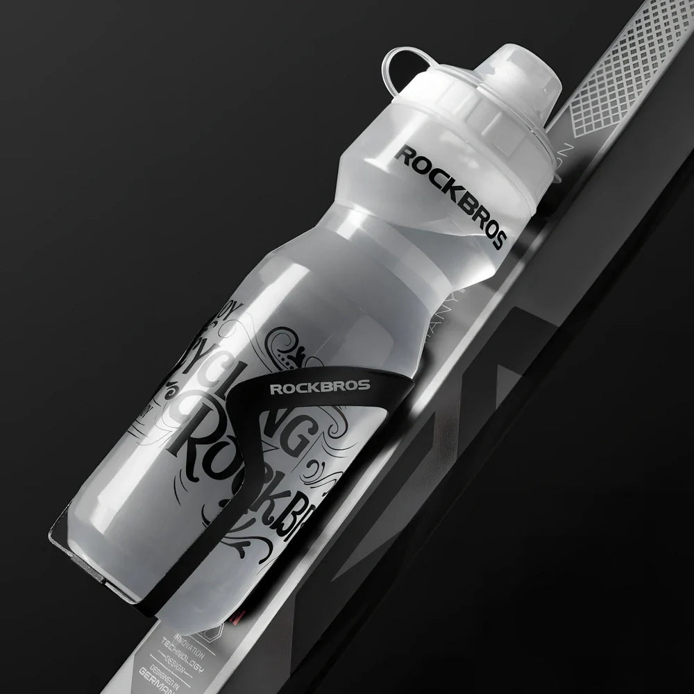 Cycling water bottle with transparent body and white press-type mouth, 750ml capacity