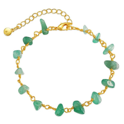 Women's bracelet with irregular gravel turquoise stones and geometric crystals on 18K copper band