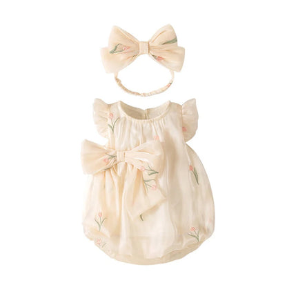 Apricot-coloured sleeveless baby jumpsuit with triangle design on hanger