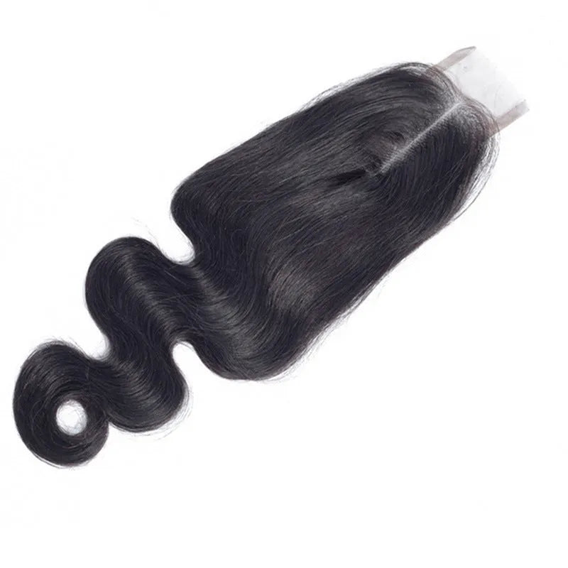 Straight natural colour human hair wig with hand-woven cap on a wig stand.
