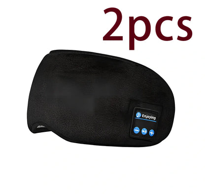 Black Bluetooth 5.0 eye mask with adjustable elastic strap and built-in speakers for wireless audio