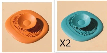 TPR vortex design sink drain cover in twilight orange, quiet blue, mango yellow, and gentian green