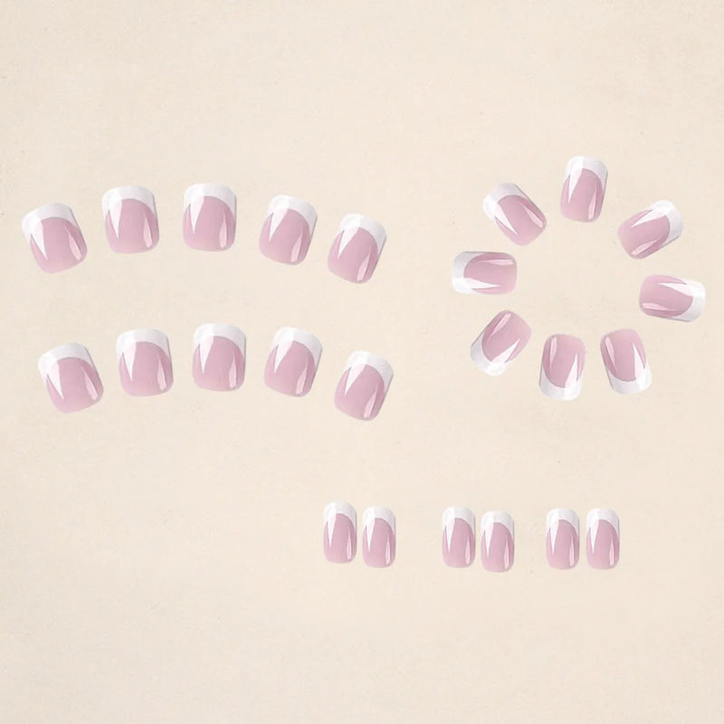 False nail set containing 24 pieces per box of plaid design nail tips made from acrylic plastic with cool white base colour suitable for at-home manicure application and artificial nail decoration