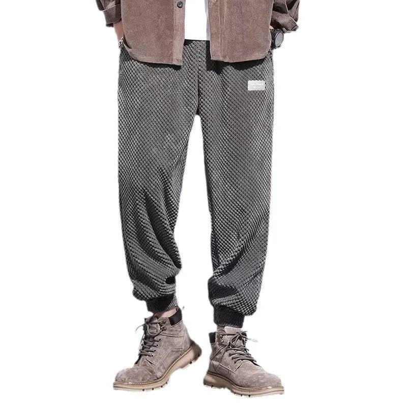 Men's grey casual sweatpants with ankle-tie design and straight leg cut