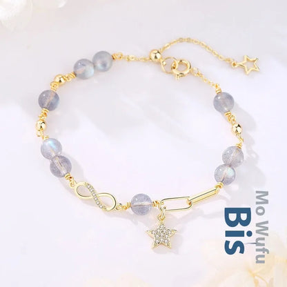 Women's mobius loop bracelet made with natural grey moonstone, strawberry quartz, or citrine crystal beads in a constellation design.