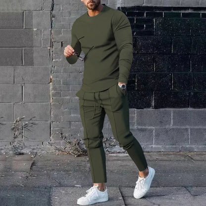 Men's light grey polyester two-piece suit set with long sleeve round neck T-shirt and matching trousers.