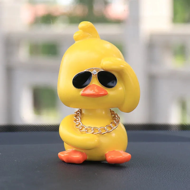 Little yellow duck resin car interior ornament in social duck poses with gold glasses and gold necklace