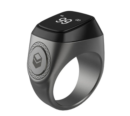 Zikr1 smart ring in metal with OLED display showing time and Tasbih count, sizes 18mm-22mm