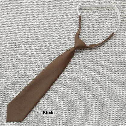 Men's navy blue cotton bow tie with arrow style shape on a white background.