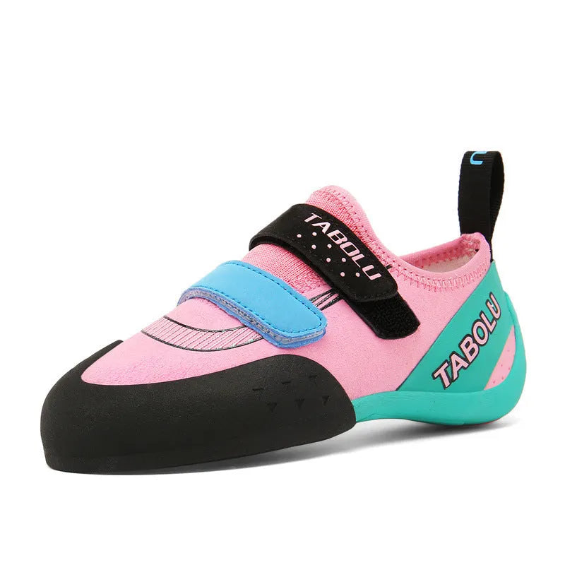 Beginner unisex rock climbing shoes with Velcro straps and a coloured rubber sole.