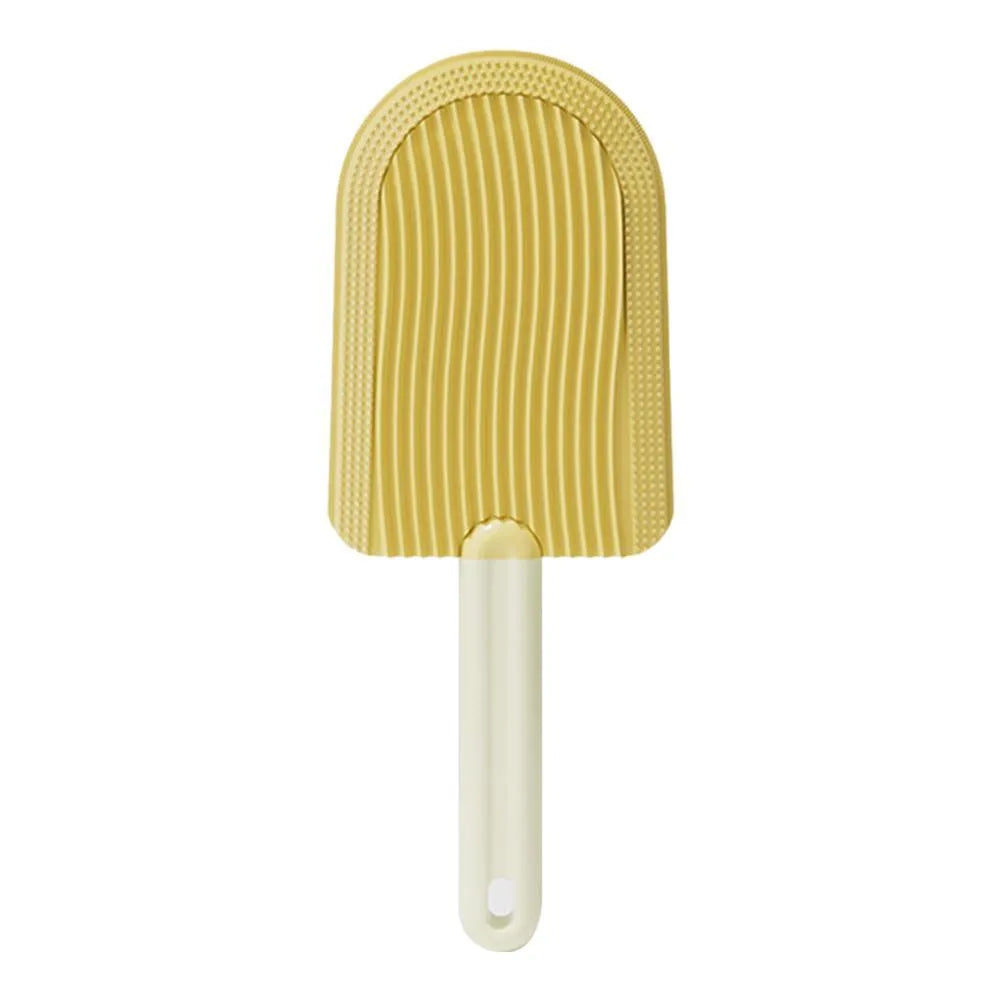 Green ice cream shaped pet grooming brush with soft silicone teeth for cats and dogs