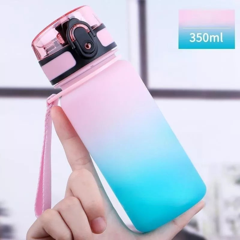 Large capacity Tritan sports water bottle in vibrant colors, perfect for hydration on the go