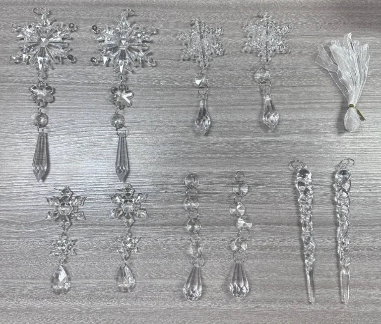 10 clear acrylic ice cone Christmas tree ornaments with hanging ribbons on green branches