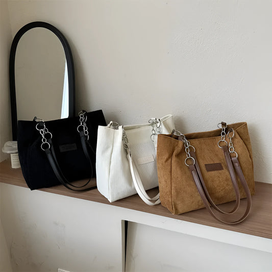 Corduroy one-shoulder tote handbag in horizontal square shape with three-dimensional pocket