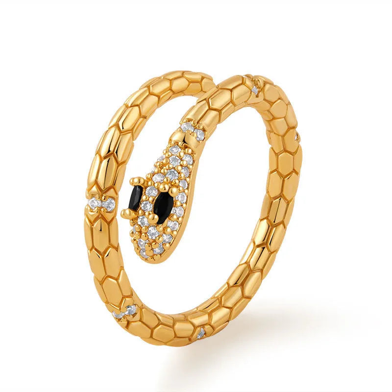 Adjustable snake-shaped index finger ring in gold colour with diamond treatment