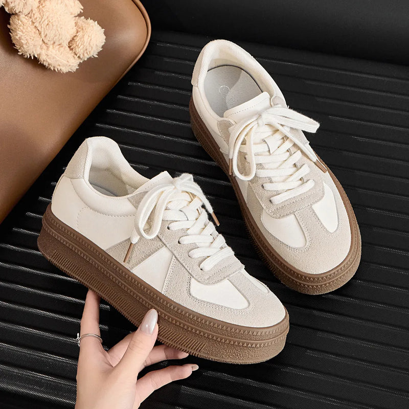 Retro round toe sports board shoes with casual lace-up design and cross shoulder straps, available in milky white and silver colours with mesh lining and rubber sole for everyday wear and height increase