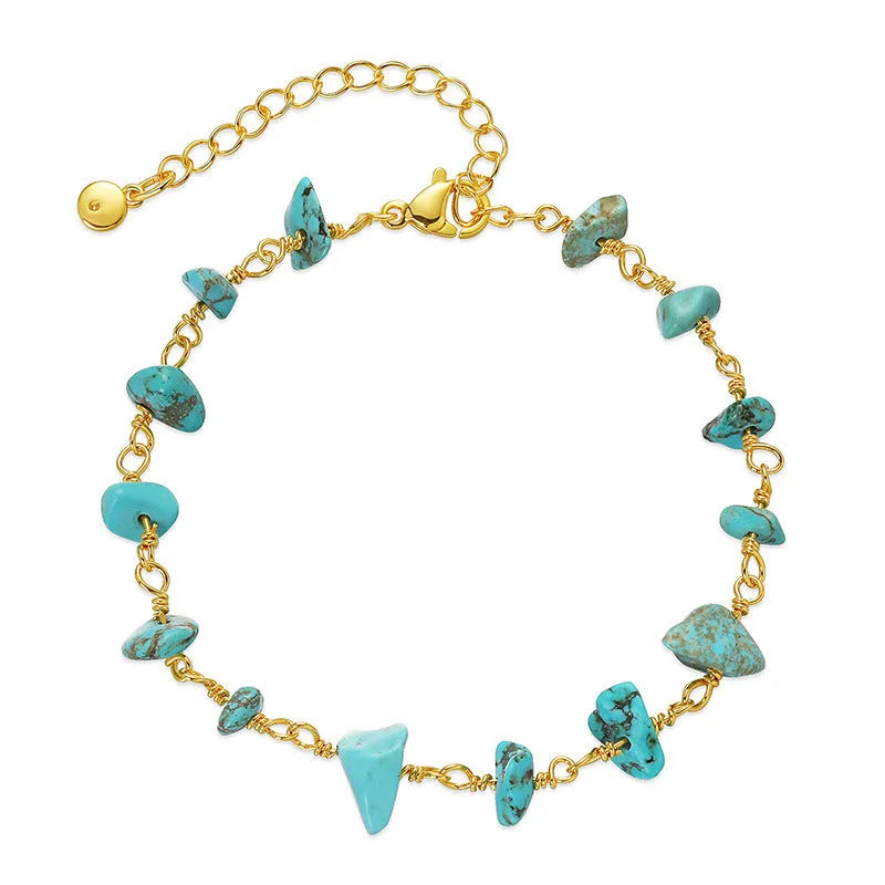 Women's bracelet with irregular gravel turquoise stones and geometric crystals on 18K copper band