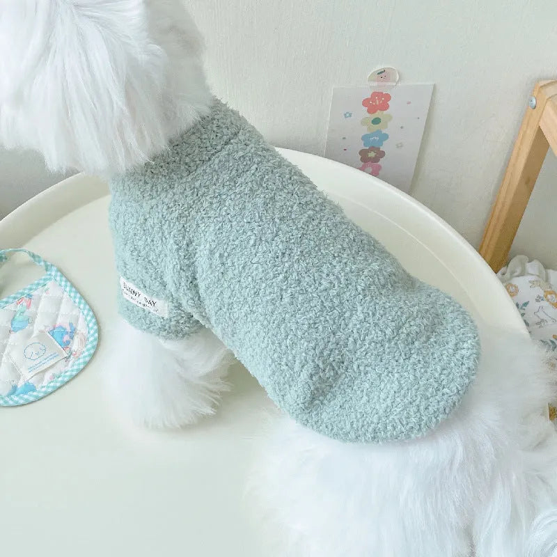 Reversible cloud velvet dog jacket shown in multiple colours and sizes