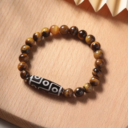 Single-circle beaded Buddha bracelet with tigereye Dzi stone, showing bead size options.