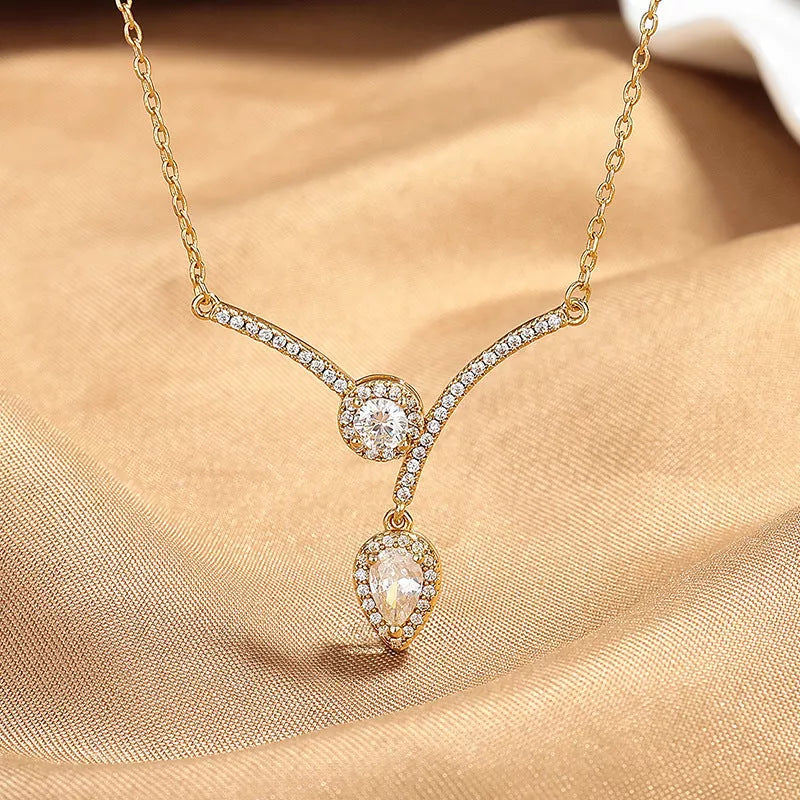 Micro Inlaid Zircon Water Drop V-shaped Necklace in silver and gold finishes