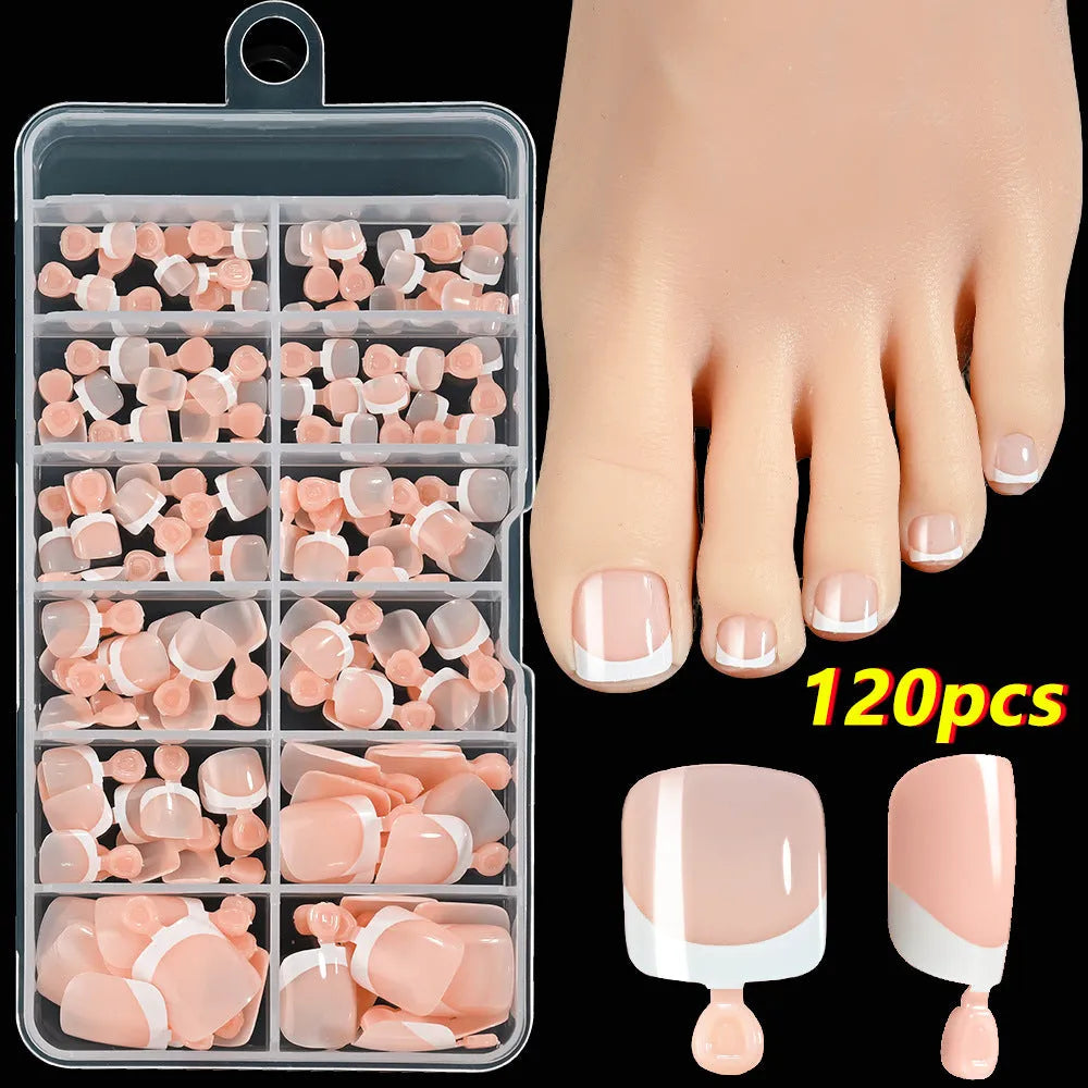 Box of 120 full square short artificial nail tips with French white edges in multiple nude shades.