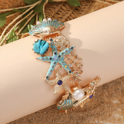 Alloy rhinestone marine bracelet with starfish design in turquoise, coral red, or coral blue for women's holiday wear