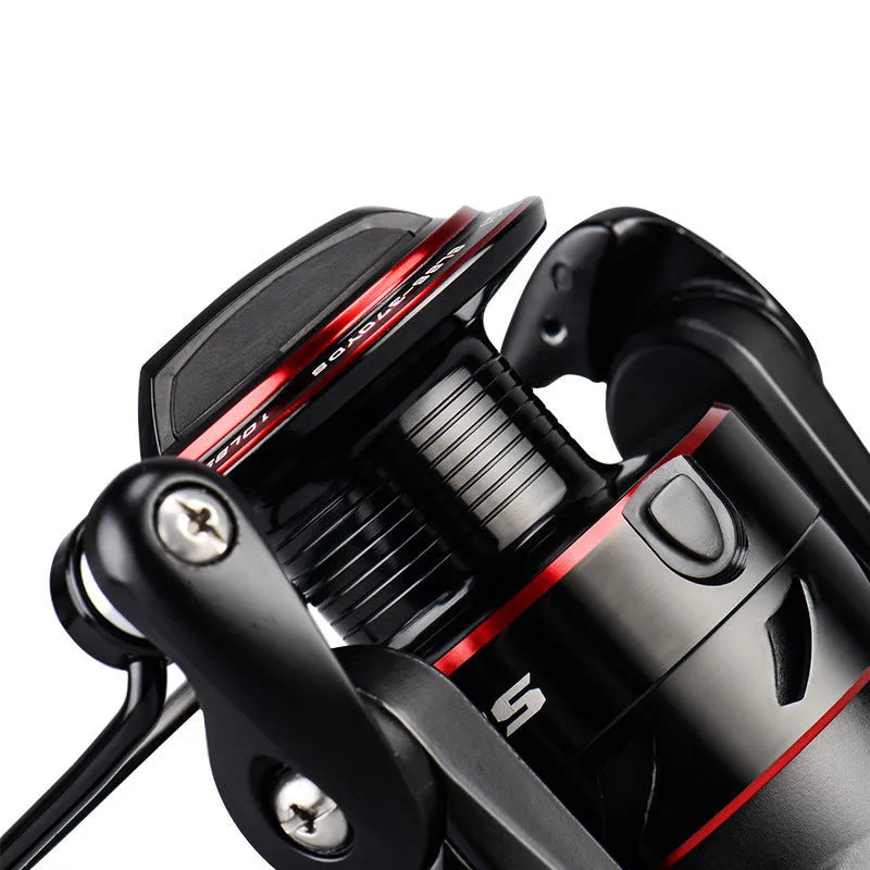 All-metal spinning fishing reel and collapsed telescopic rod combo on a background