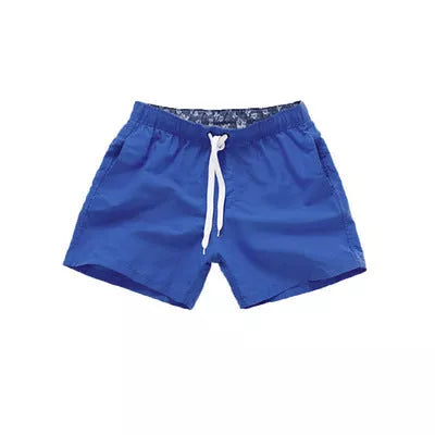 Men's summer surf shorts in various colors, made from 100% polyester for quick drying and durability
