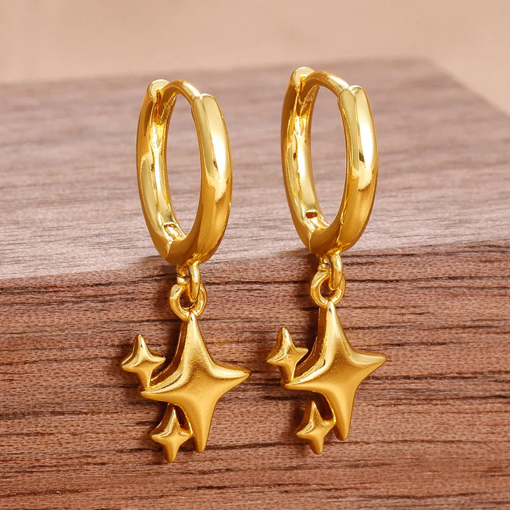 Small star-shaped copper earrings for women in gold or silver, supplied as one pair