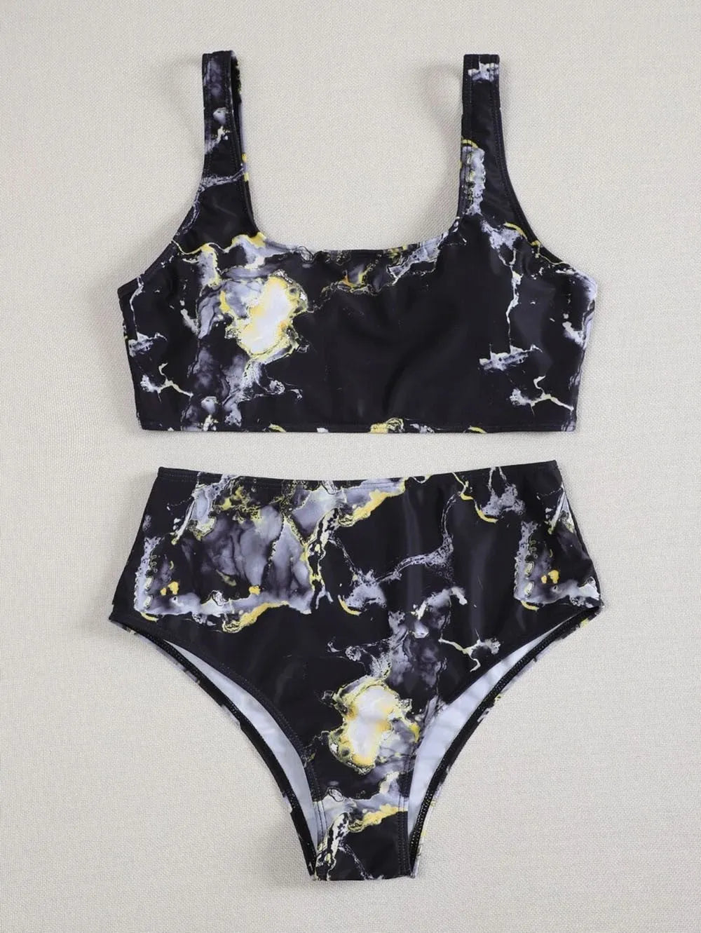 Women's high-waist bikini set with U-neck top in a blue marble tie-dye print.