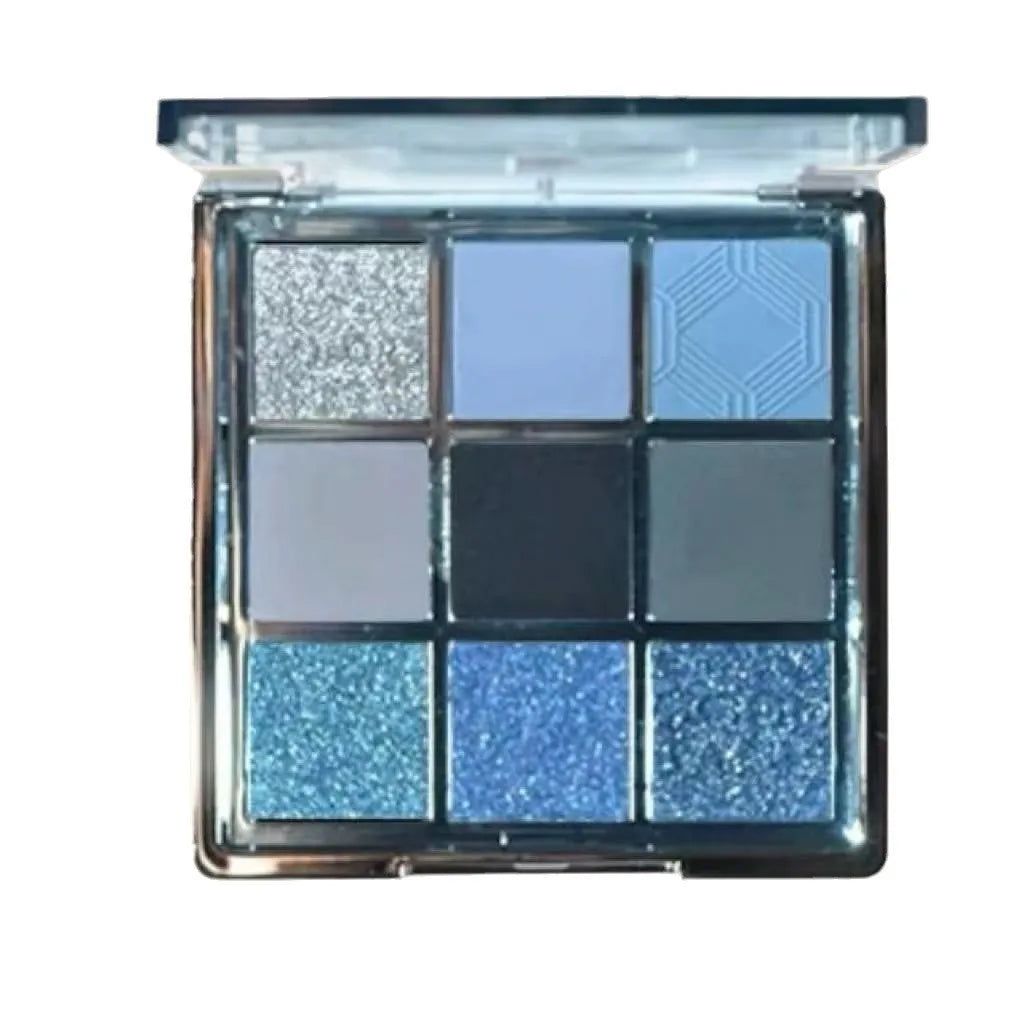 Low saturation blue smoked eye shadow palette with nine colours including matte and shimmer finishes with diamond debris textures