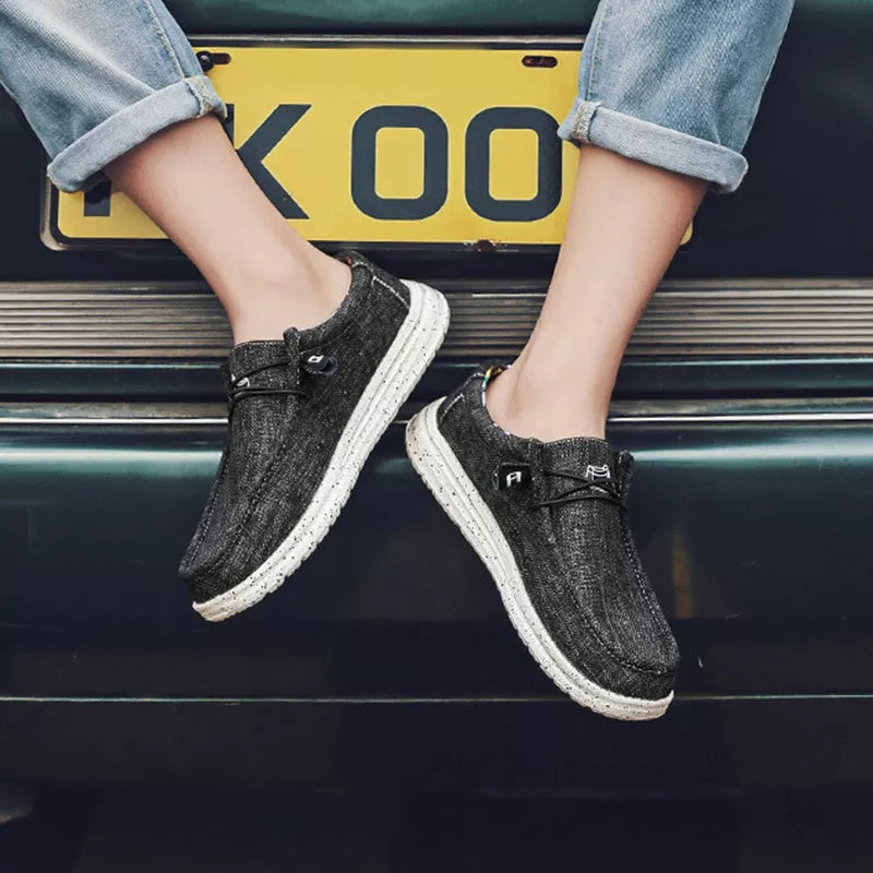 Men's casual canvas loafers in various colors with breathable design and shock-absorbing sole