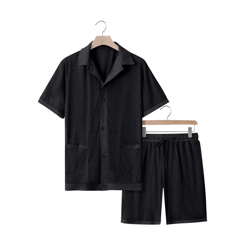 Women's lake blue see-through short sleeve cardigan and matching shorts beach cover-up set laid flat.
