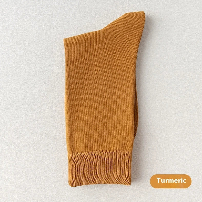 Mid-calf business socks in solid colours with combed cotton construction and deodorant function