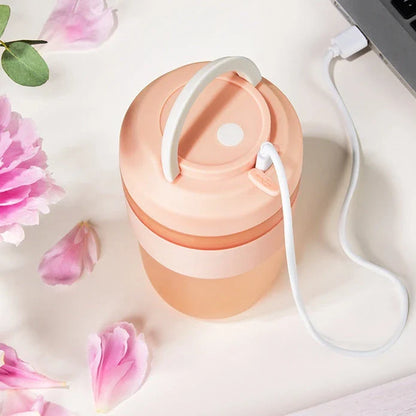 Powerful portable blender with 4 stainless steel blades for creating delicious smoothies and shakes on the go