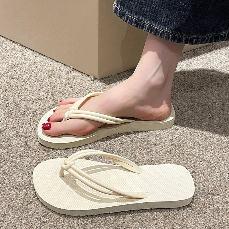 PVC injection moulded flip flops in toe-covering casual style with non-slip sole