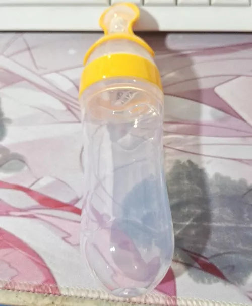Baby Spoon Bottle Feeder in various colors for easy, safe baby feeding