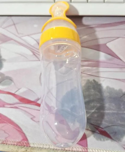 Baby Spoon Bottle Feeder in various colors for easy, safe baby feeding