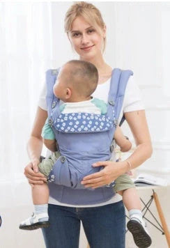 Multifunctional baby carrier in blue daisy pattern with adjustable waistband and small bag