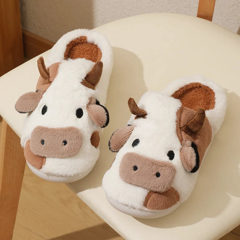 Women's faux fur cow slippers with non-slip soles, available in white and coffee colors