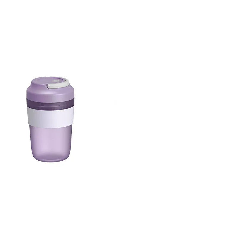 Green portable USB rechargeable blender cup with lid and four stainless steel blades, 400ml capacity.