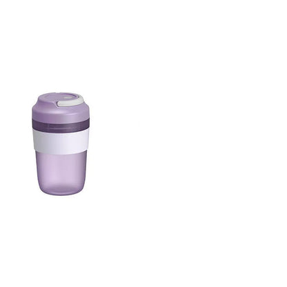 Green portable USB rechargeable blender cup with lid and four stainless steel blades, 400ml capacity.