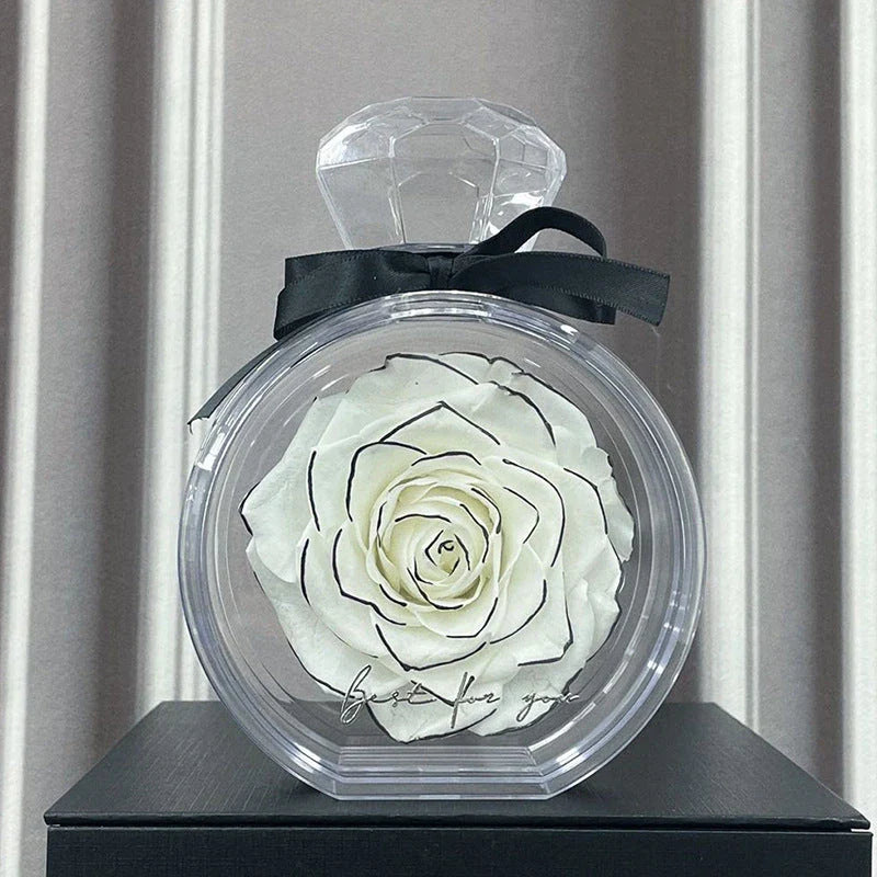 Preserved floral ornaments in various colors, displayed in a transparent cover for elegant home decor