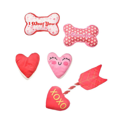 Plush pet dental toy in peach heart pink colour with textured surface for tooth cleaning, 15cm length